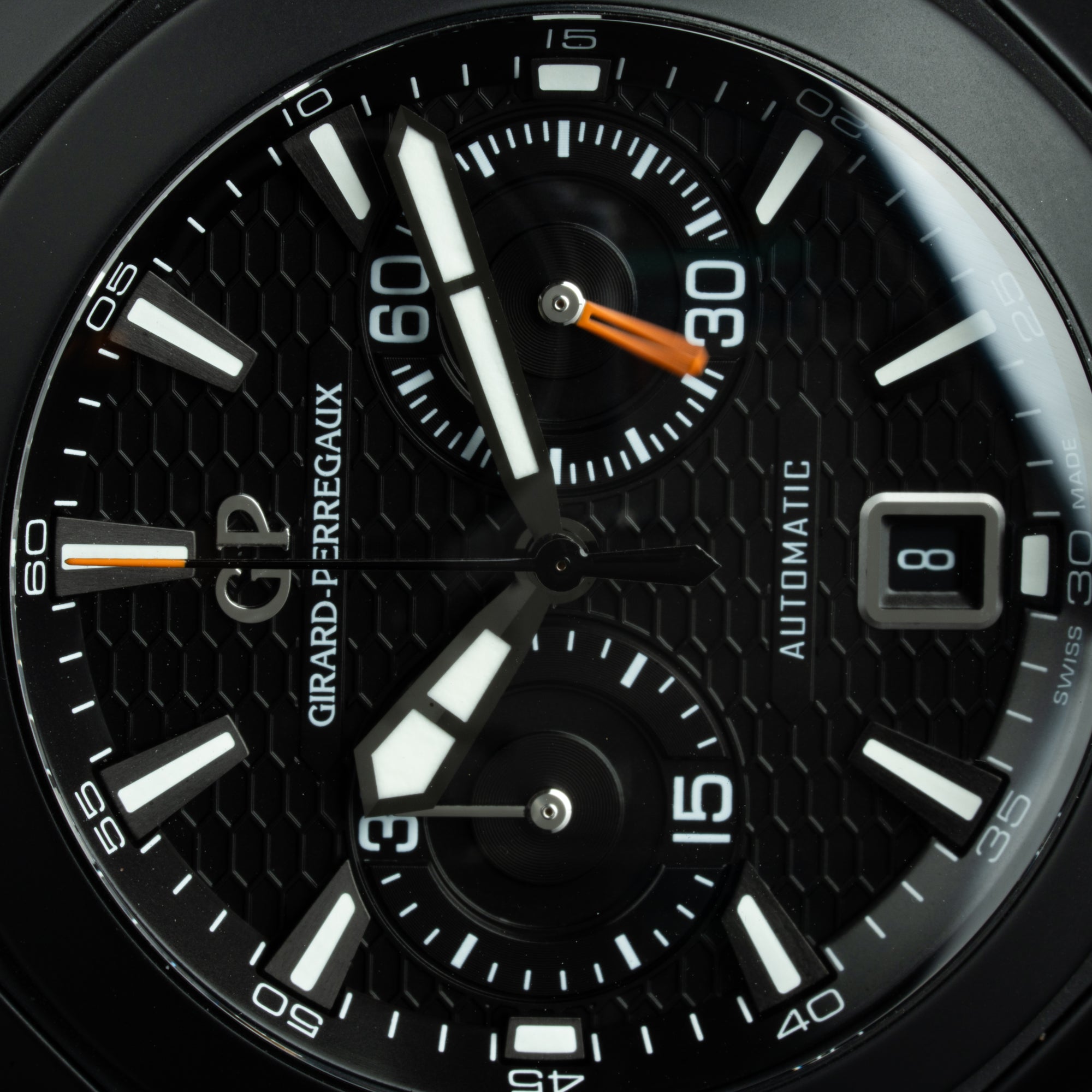 Girard Perregaux Chrono Hawk 44mm Closeup Black Dial lumens